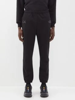 The North Face XX Kaws Logo Embroidered Cotton-blend Sweatpants